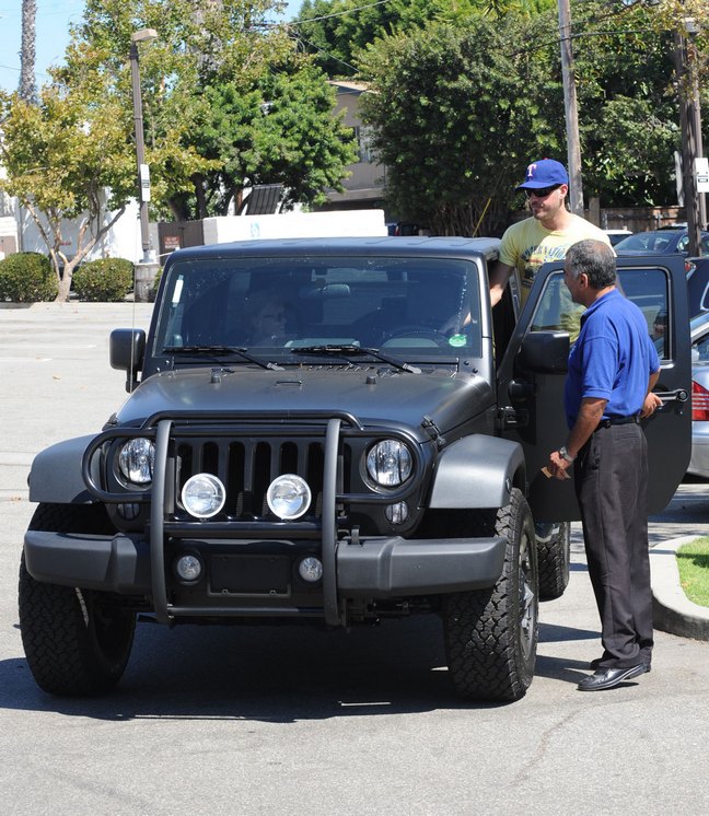 Jim Toth, yellow tshirt, jeep wrangler